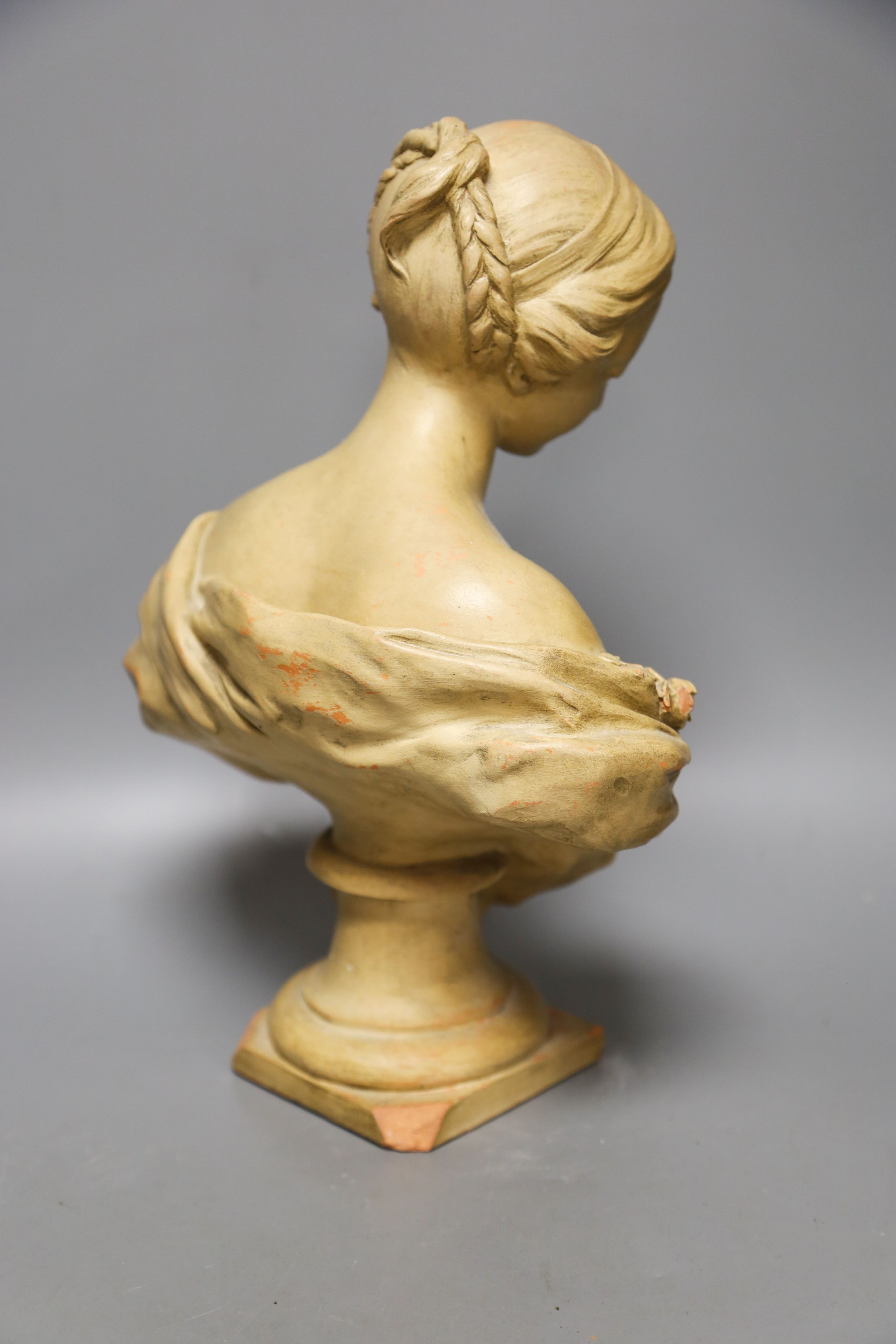 A cream painted terracotta bust of a lady 33cm